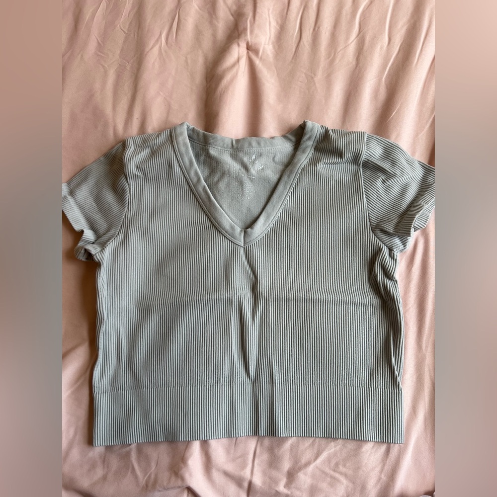 3 t-shirts, size M, colors:black,white, and gray. MUST GO